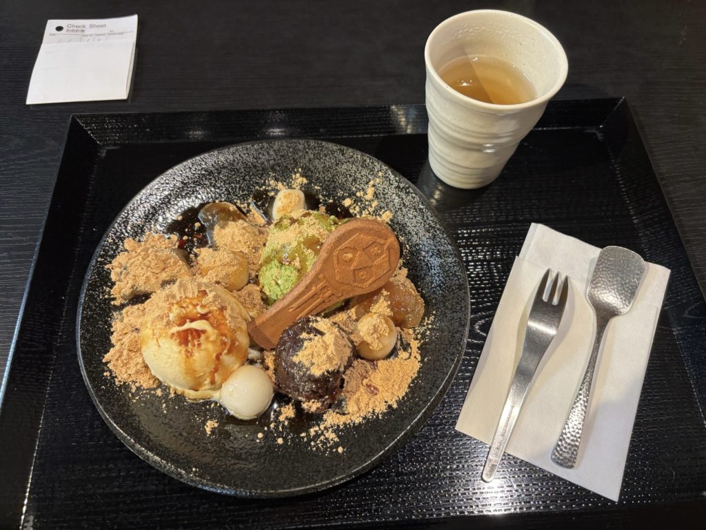 Elaborate dessert platter with warabi mochi, ice cream, and traditional sweets