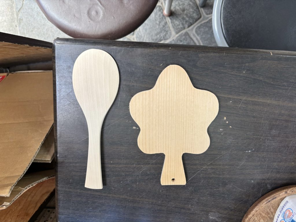 Traditional rice paddle and maple leaf postcard items ready for branding experience