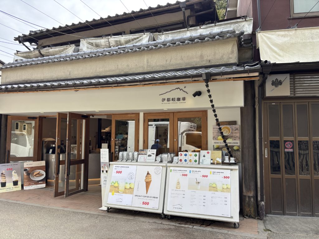 Itsuki Coffee exterior with white traditional Japanese house facade in Miyajima