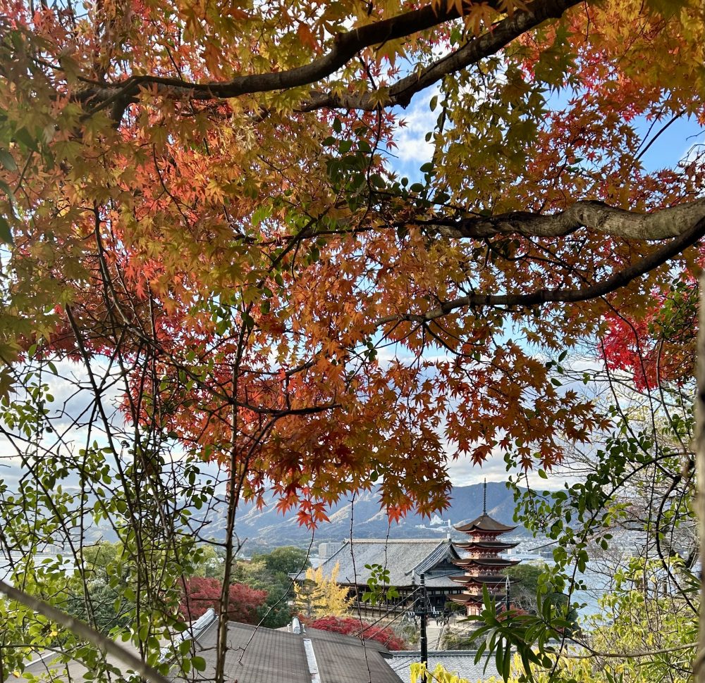 People strolling through Momijidani during the Meiji period